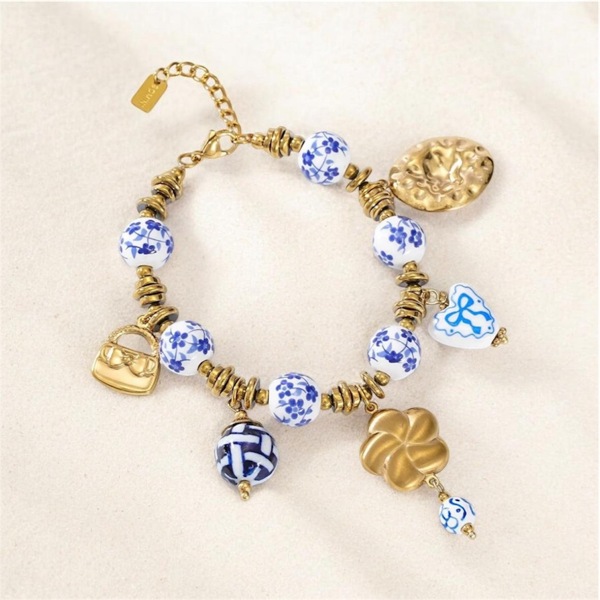 Bracelet charms bleu & doré – Nouvelle collection