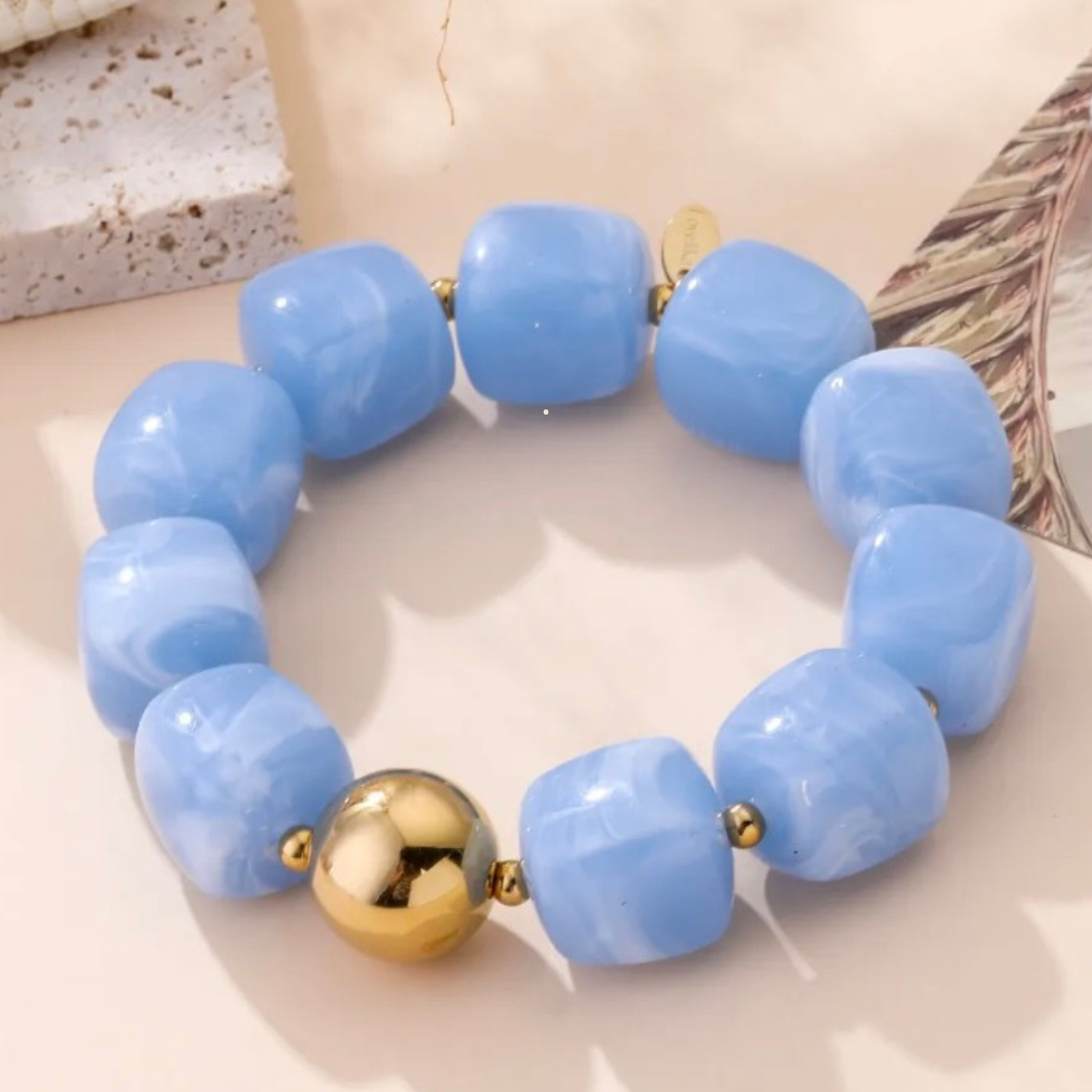 Bracelet Élégance Minérale – Perles Marbrées & Sphère Dorée